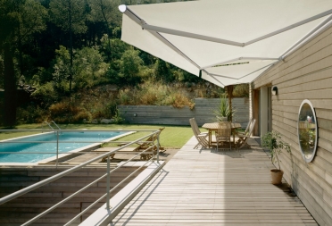 Folding arm awnings